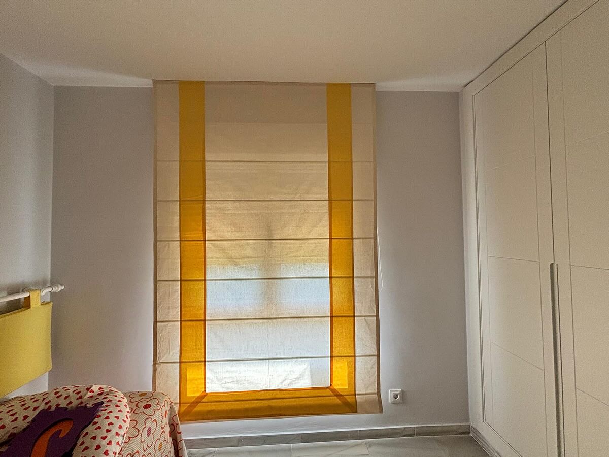Wide selection of premium curtain fabrics (velvets, linens, sheers) at Tapicería Los Boliches showroom