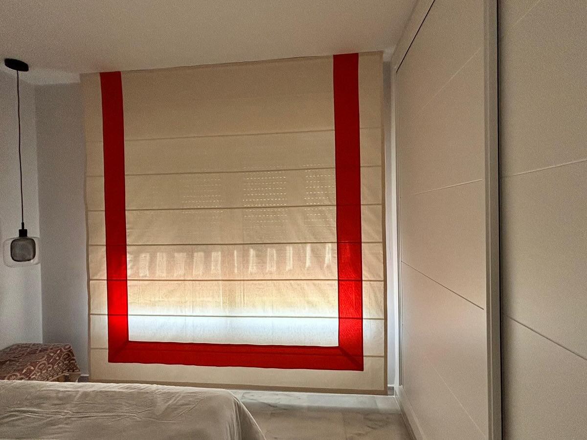 Detail of functional and decorative blackout curtains installed in a home, Fuengirola